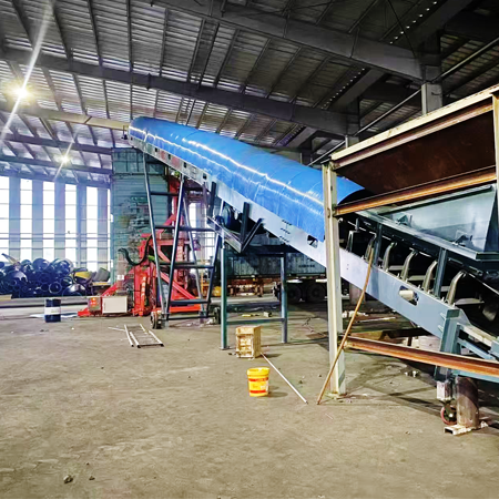ZFITA container tilter working with belt conveyor for coal loading